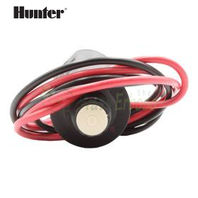 Solenoid 9V Hunter me tela kuq e zi për valvula ujitjeje, mbi tavolinë pune