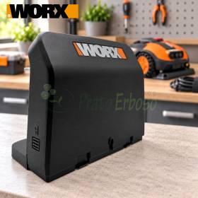 Torretta di ricarica Vision WORX nera su banco da lavoro in officina