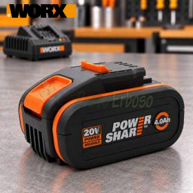 Worx WA3644 20V 4Ah PowerShare lithium battery on workbench with charger in background